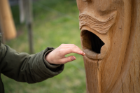 Touch stele (oak trunk with face)