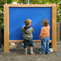 Colouring wall with liquid crayons for toddlers