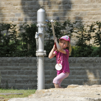 Playground pump for suction from a cistern
